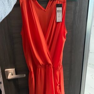 BCBG romper,  never worn, NWT, fits small